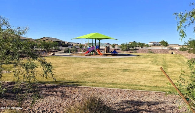 view of play area with a yard