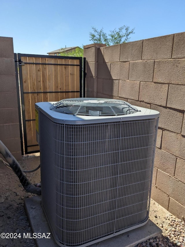 exterior details featuring central air condition unit and a jacuzzi