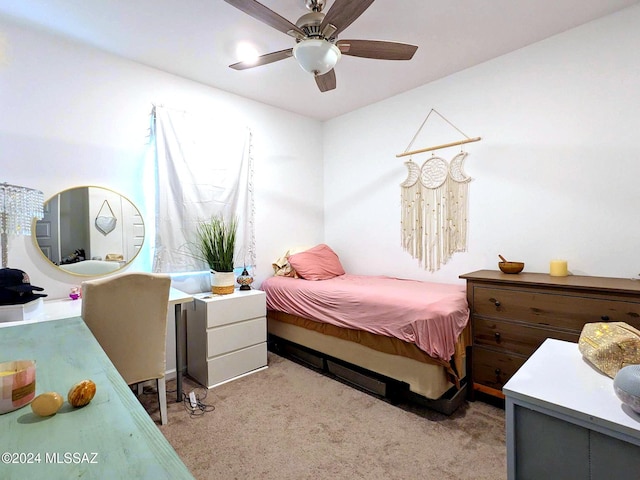 carpeted bedroom with ceiling fan