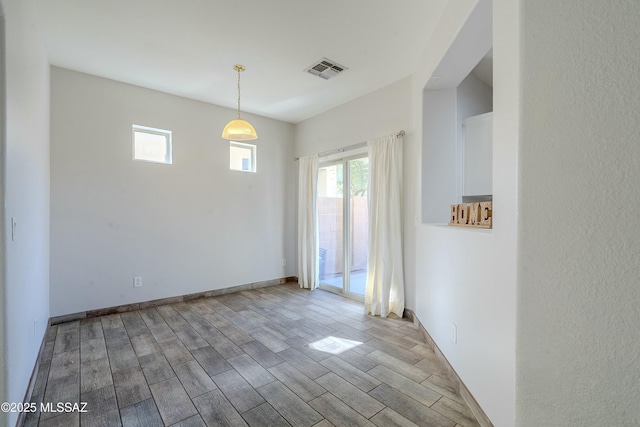 unfurnished room with light hardwood / wood-style flooring