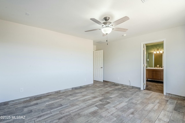 unfurnished room featuring light hardwood / wood-style floors and ceiling fan