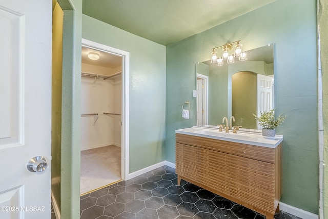 bathroom with vanity and tile patterned floors