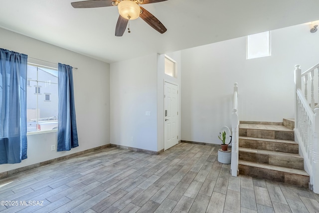 interior space featuring ceiling fan and light wood-type flooring