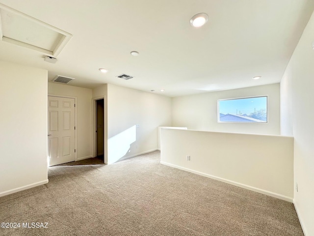 empty room with carpet flooring