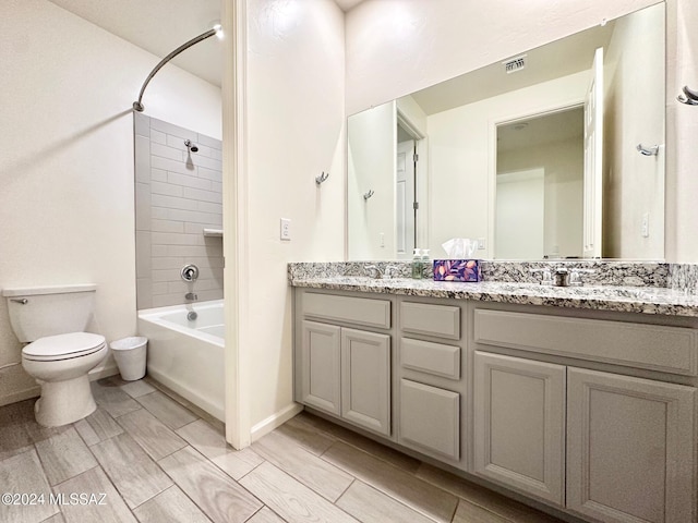 full bathroom featuring vanity, toilet, and shower / bathing tub combination