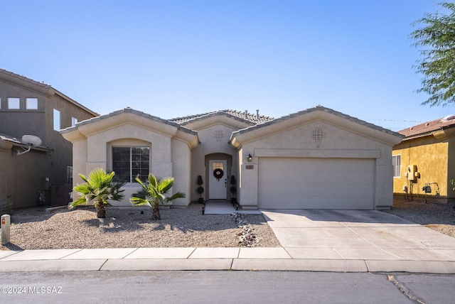 view of front of property with a garage