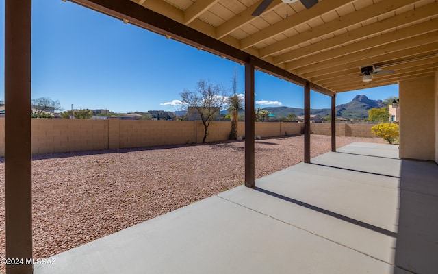 view of patio / terrace with a mountain view