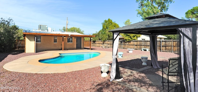 view of pool featuring a gazebo and a patio area