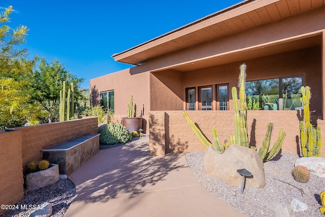 view of home's exterior featuring a patio area