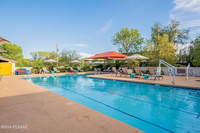 view of swimming pool featuring a patio