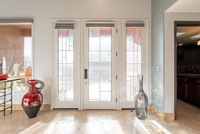 doorway featuring a wealth of natural light