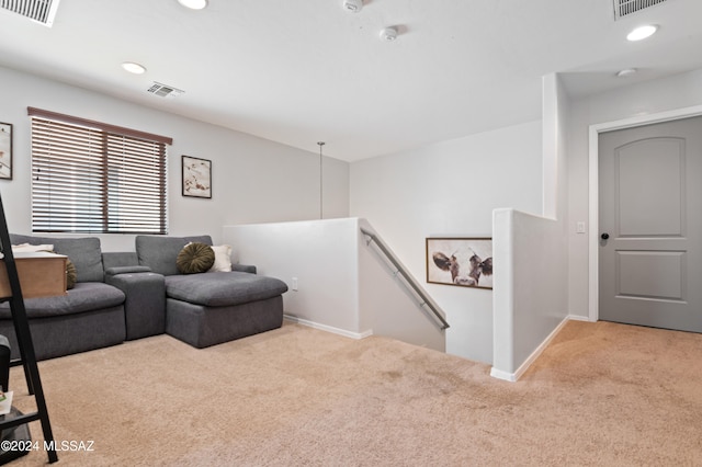 living room with light colored carpet