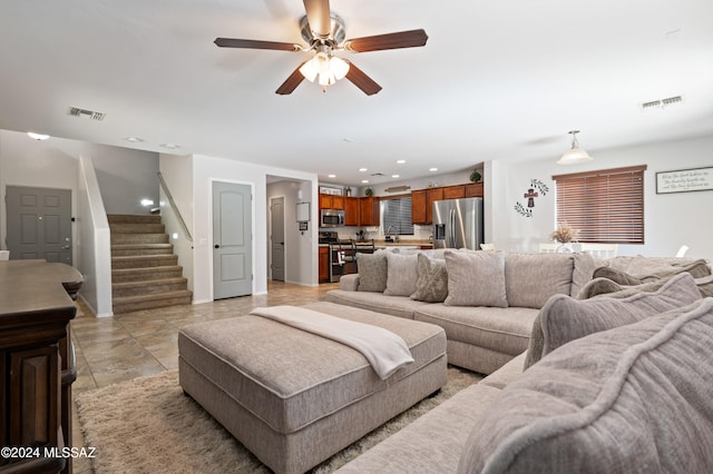 living room with ceiling fan