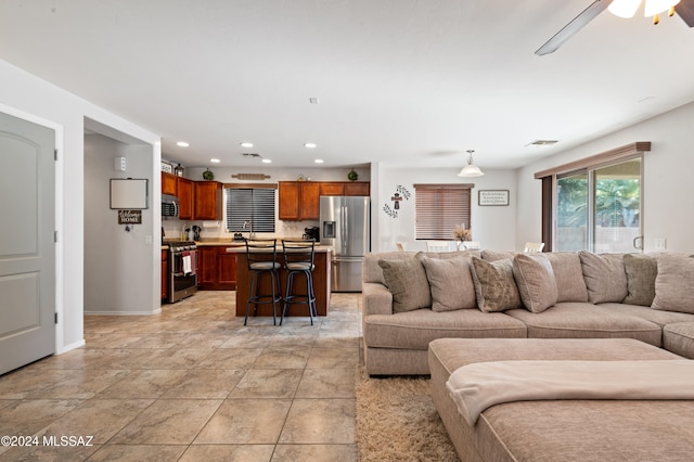 living room featuring ceiling fan