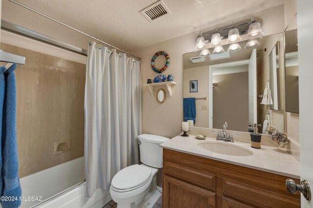 full bath with visible vents, shower / bathtub combination with curtain, toilet, vanity, and a textured ceiling