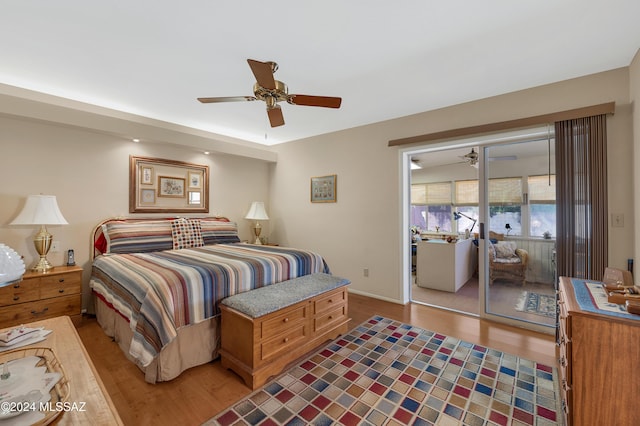 bedroom with light wood finished floors and ceiling fan