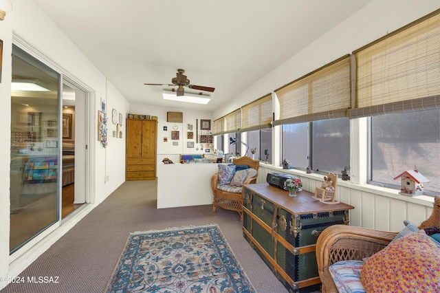 sunroom with ceiling fan