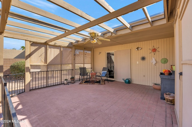 view of patio / terrace with a ceiling fan and a pergola