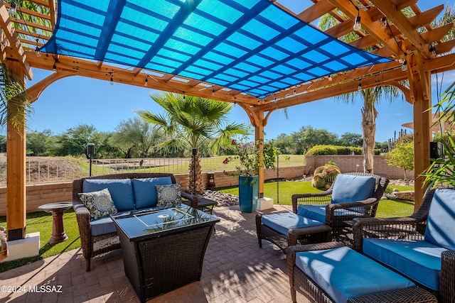 view of patio / terrace with an outdoor living space and a pergola