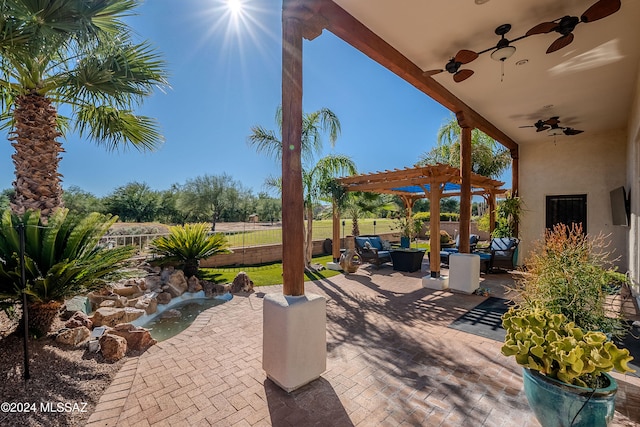 view of patio / terrace featuring an outdoor living space, a pergola, and ceiling fan