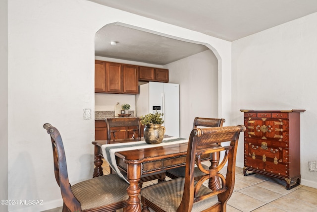 dining room with light tile patterned floors