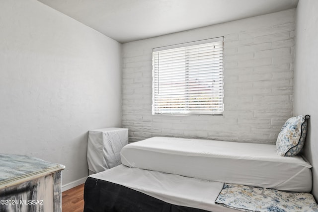 bedroom featuring hardwood / wood-style flooring