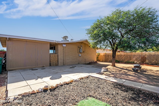 rear view of house featuring a patio area