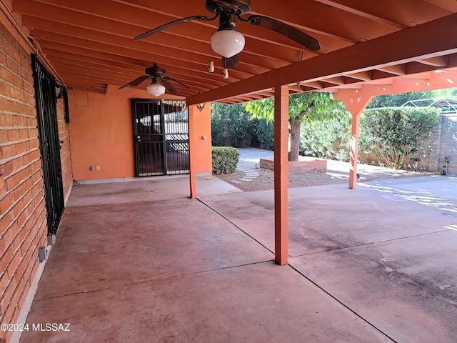 view of patio / terrace featuring ceiling fan