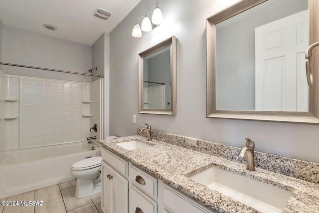 full bathroom featuring vanity, tile patterned floors, toilet, and shower / bathtub combination