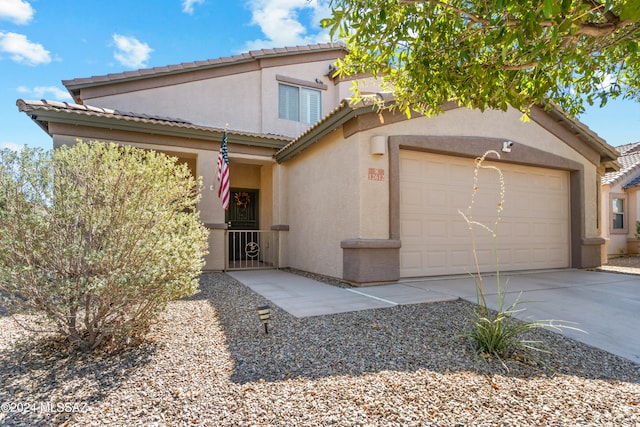 view of front of property featuring a garage