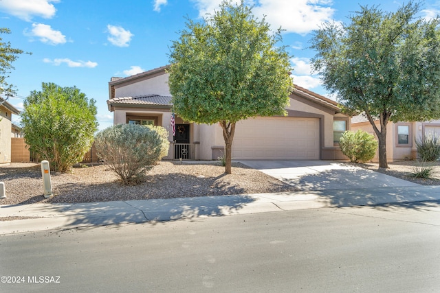 view of front of home with a garage