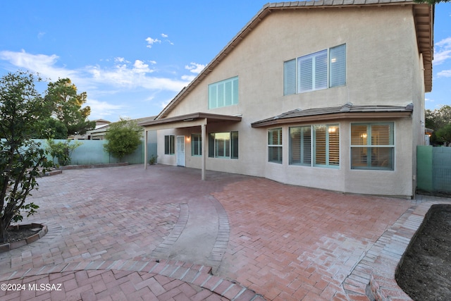 rear view of property with a patio