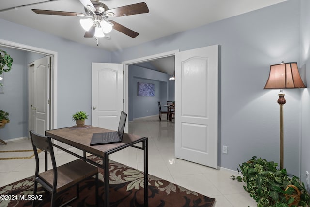 tiled dining room with ceiling fan