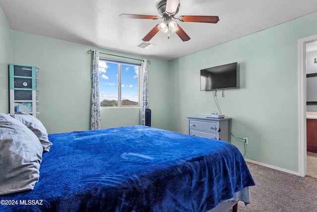 carpeted bedroom with ceiling fan