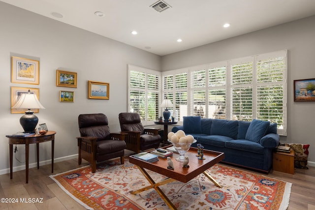 living room with light hardwood / wood-style floors