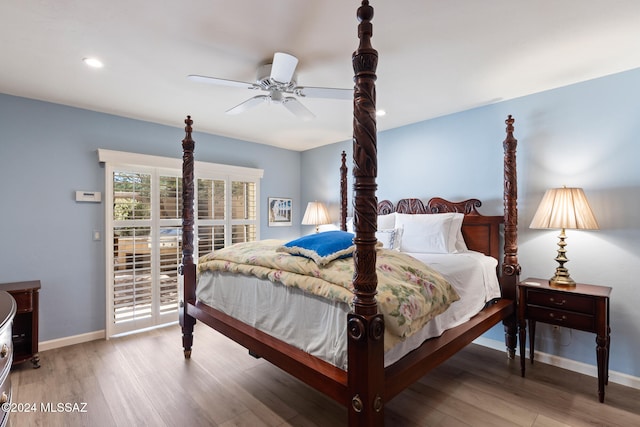 bedroom featuring ceiling fan and hardwood / wood-style flooring