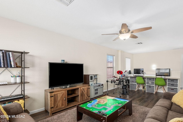 living room with hardwood / wood-style floors and ceiling fan