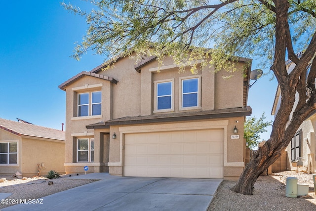 view of front of property with a garage