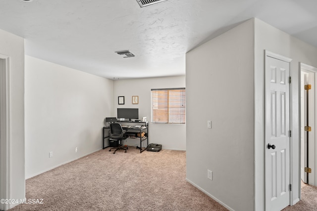 view of carpeted home office