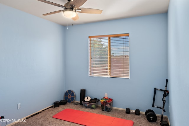 workout area with carpet flooring and ceiling fan