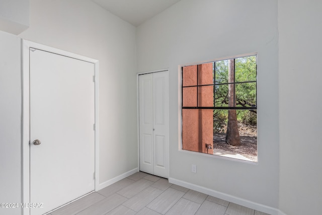 unfurnished bedroom with multiple windows