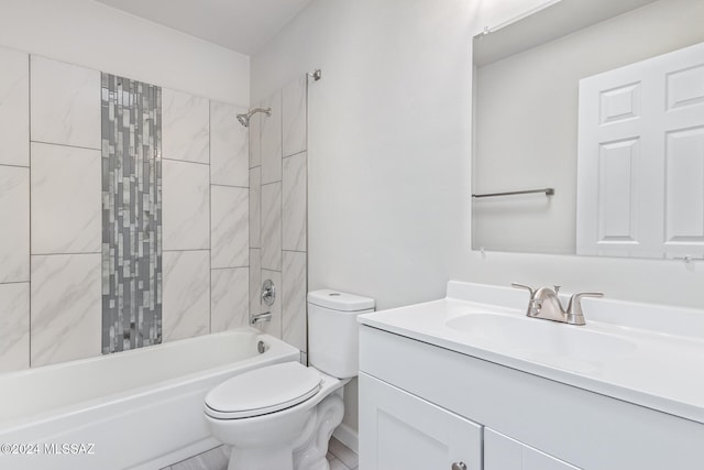 full bathroom with vanity, toilet, and tiled shower / bath combo