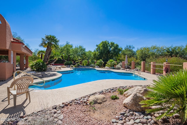 view of pool with a patio