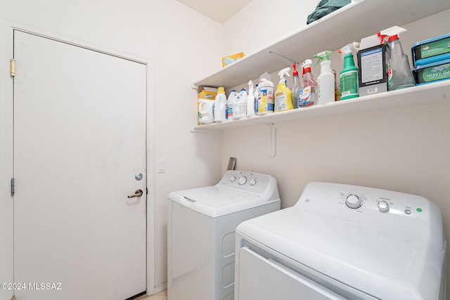 laundry area with washing machine and dryer