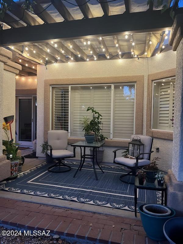 view of patio / terrace featuring a pergola