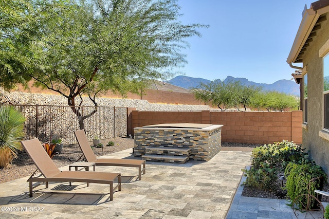 view of patio with a mountain view