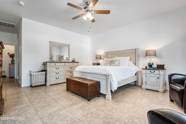 bedroom featuring ceiling fan and light tile patterned floors