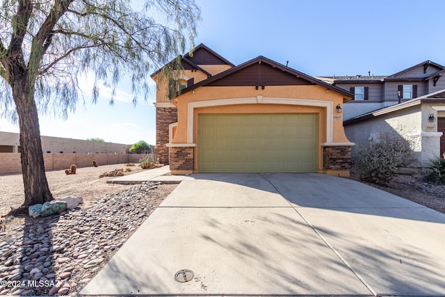 view of front of home with a garage