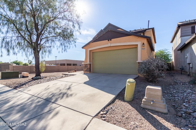 view of front of property with a garage