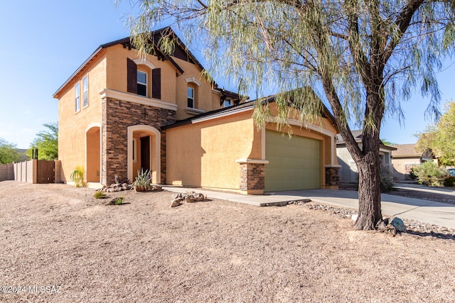 view of front of property featuring a garage